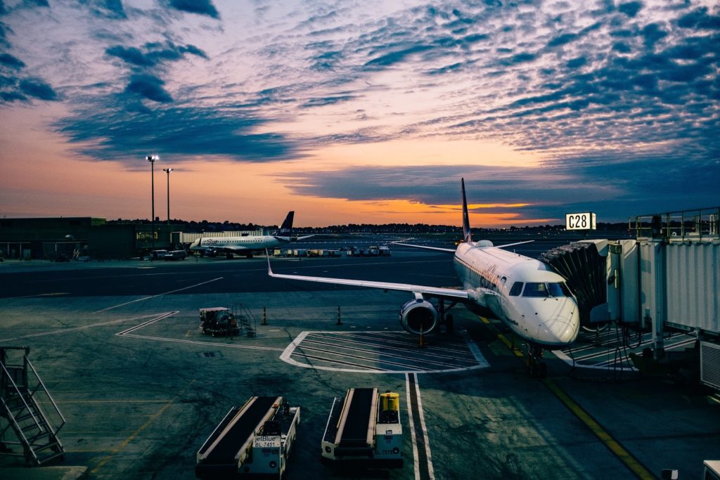 Interpol Red Notice lifted at Kornfeld LLP. Plane at gate waiting to take off. 